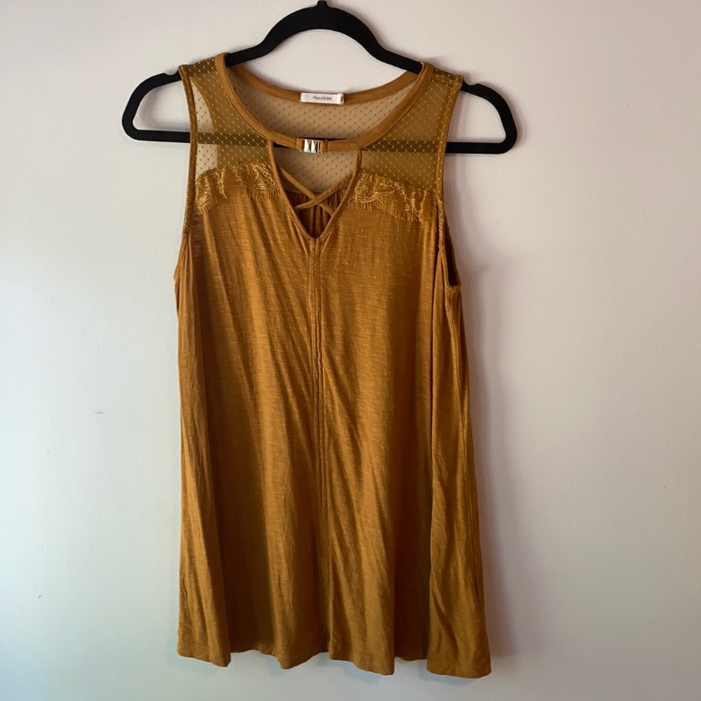 Flared sleeveless blouse